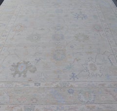 Muted Colored Hand-Knotted Modern Oushak with Light Cream Background
