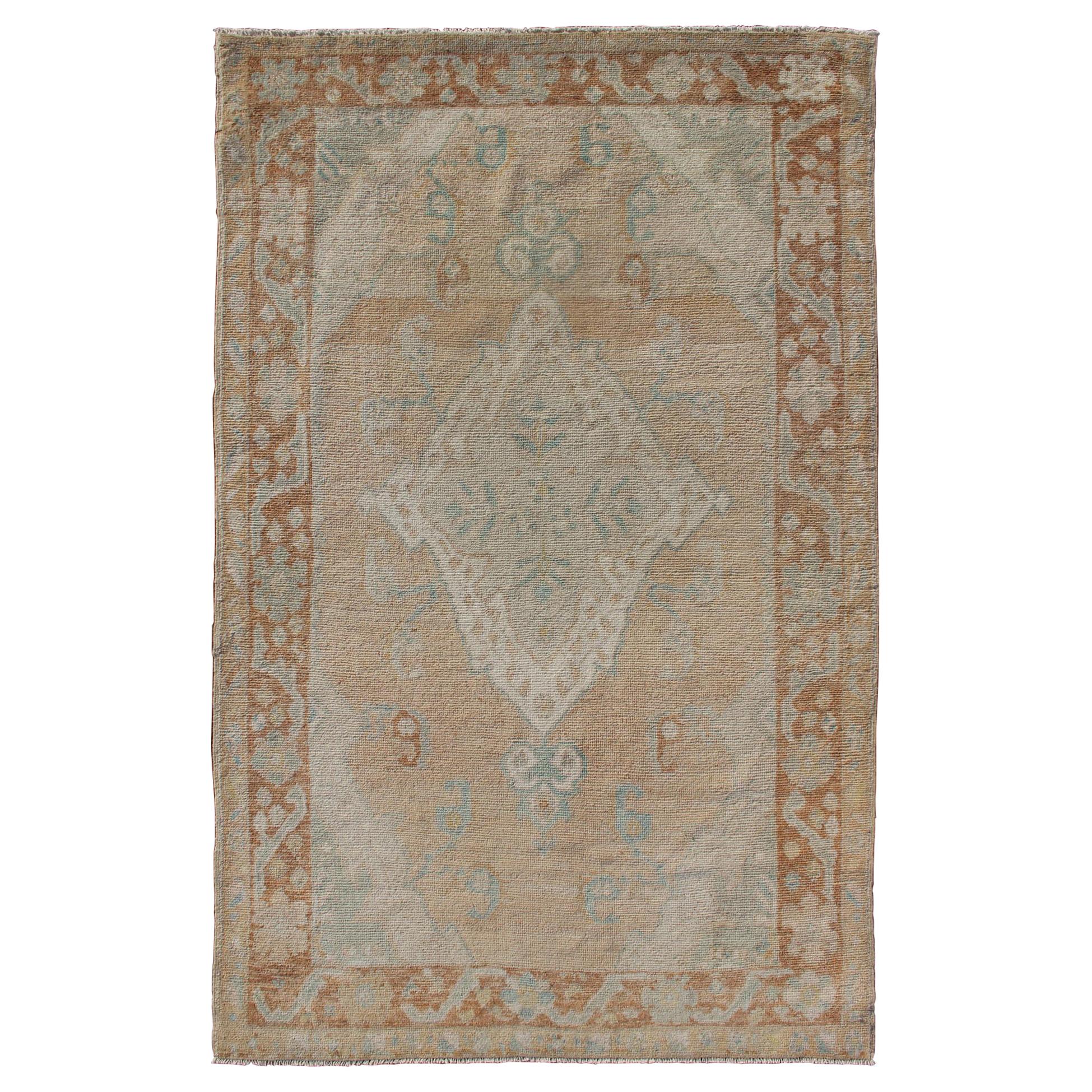 Muted Colored Turkish Oushak Rug is Subdued Medallion Design For Sale