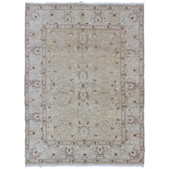 Muted Colors Afghan Rug with All-Over Design and Light Buttery Color Background