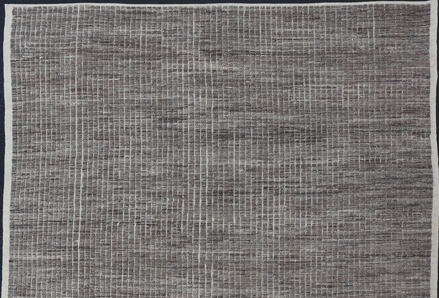 Dark Gray Casual Modern Rug by Keivan Woven Arts with High and Low Textured Pile. Keivan Woven Arts / rug AFG-36093, country of origin / type: Afghanistan / modern rug with pile, condition: new
Measures: 8'8 x 11'10.
This brand new rug features a