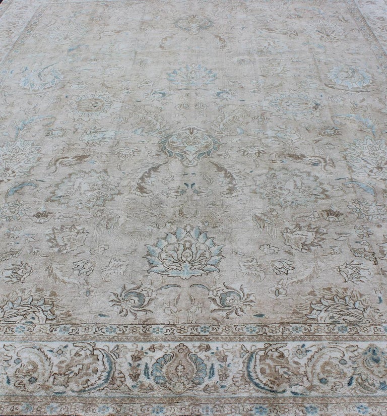 Muted Gray, Blue, and Ivory Vintage Persian Tabriz Rug with Floral