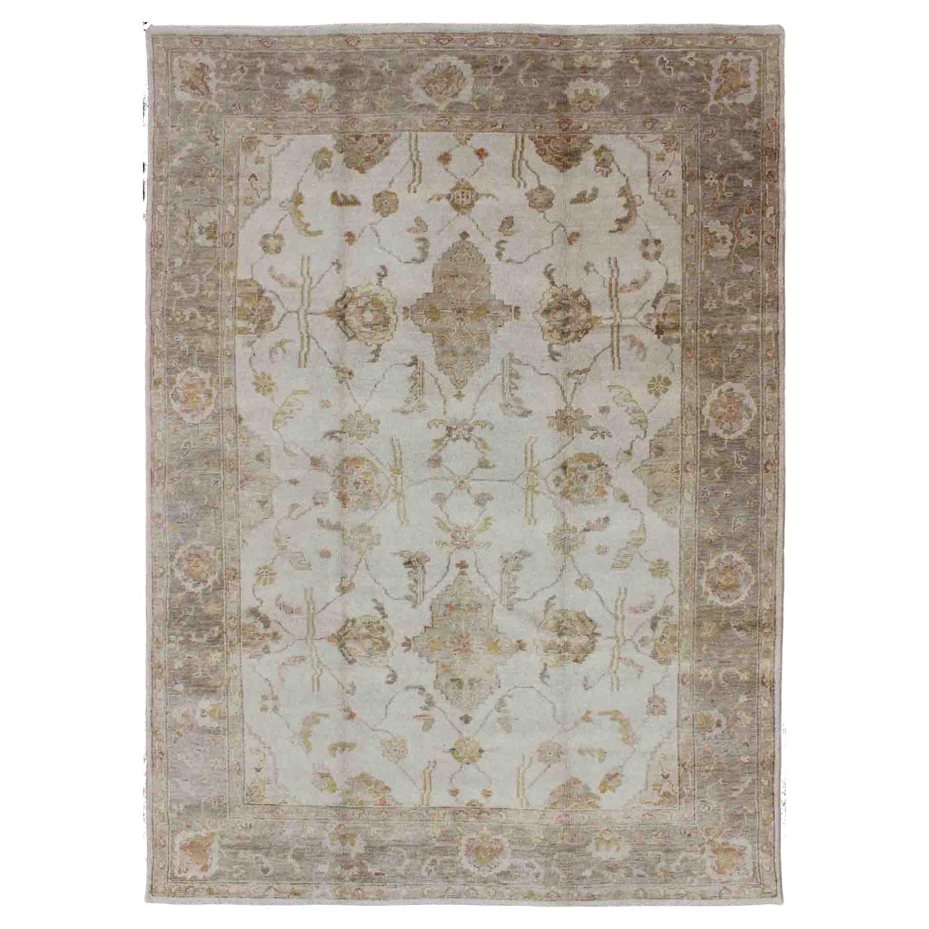 Muted Hand Knotted Oushak Design Rug in Taupe Border & Ivory Background