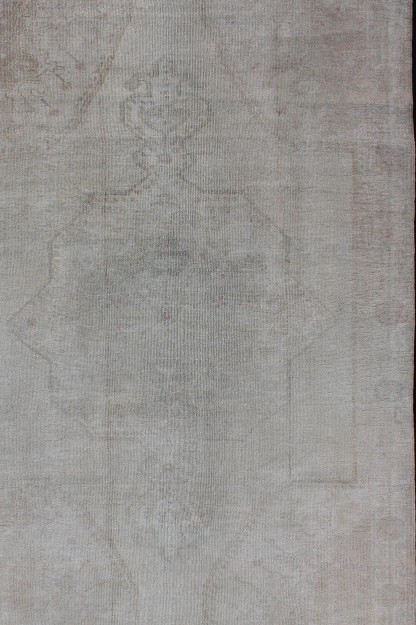 Hand-Knotted Neutral Vintage Oushak Turkish Rug in Pale Colors For Sale