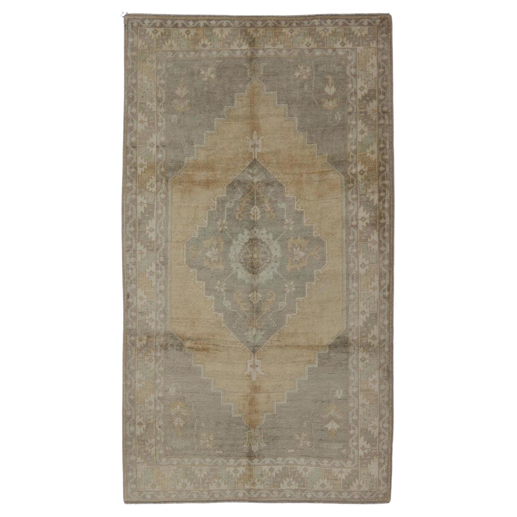 Muted Mid-20th Century Vintage Oushak Rug with Medallion in Gray and Butter For Sale