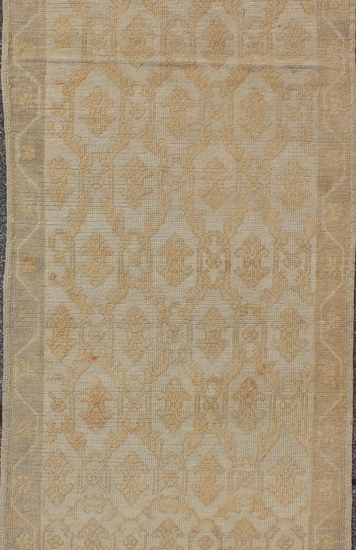 Hand-Knotted Midcentury Turkish Oushak Runner with Latticework Design in Cream, Yellow, Taupe For Sale