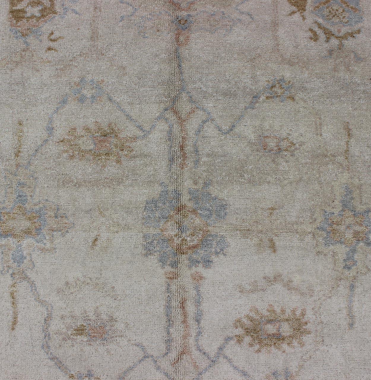 Muted Oushak Rug in Blue, Light Brown, and White In Excellent Condition For Sale In Atlanta, GA