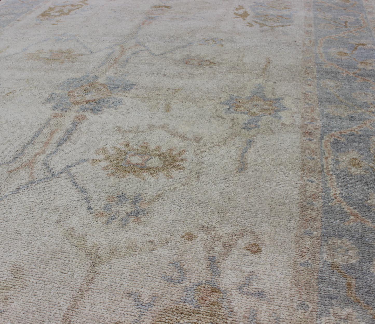 Contemporary Muted Oushak Rug in Blue, Light Brown, and White For Sale