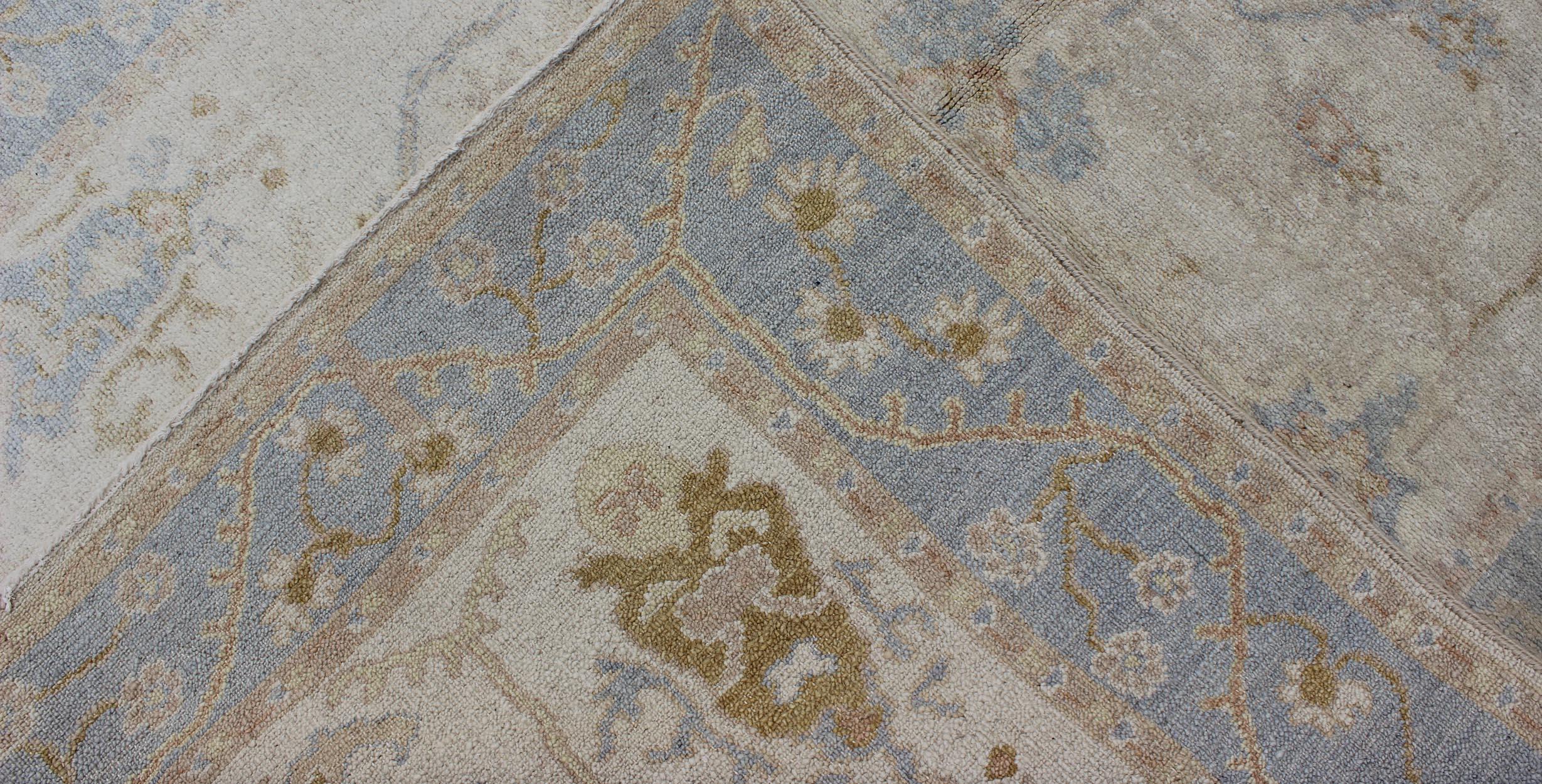 Wool Muted Oushak Rug in Blue, Light Brown, and White For Sale