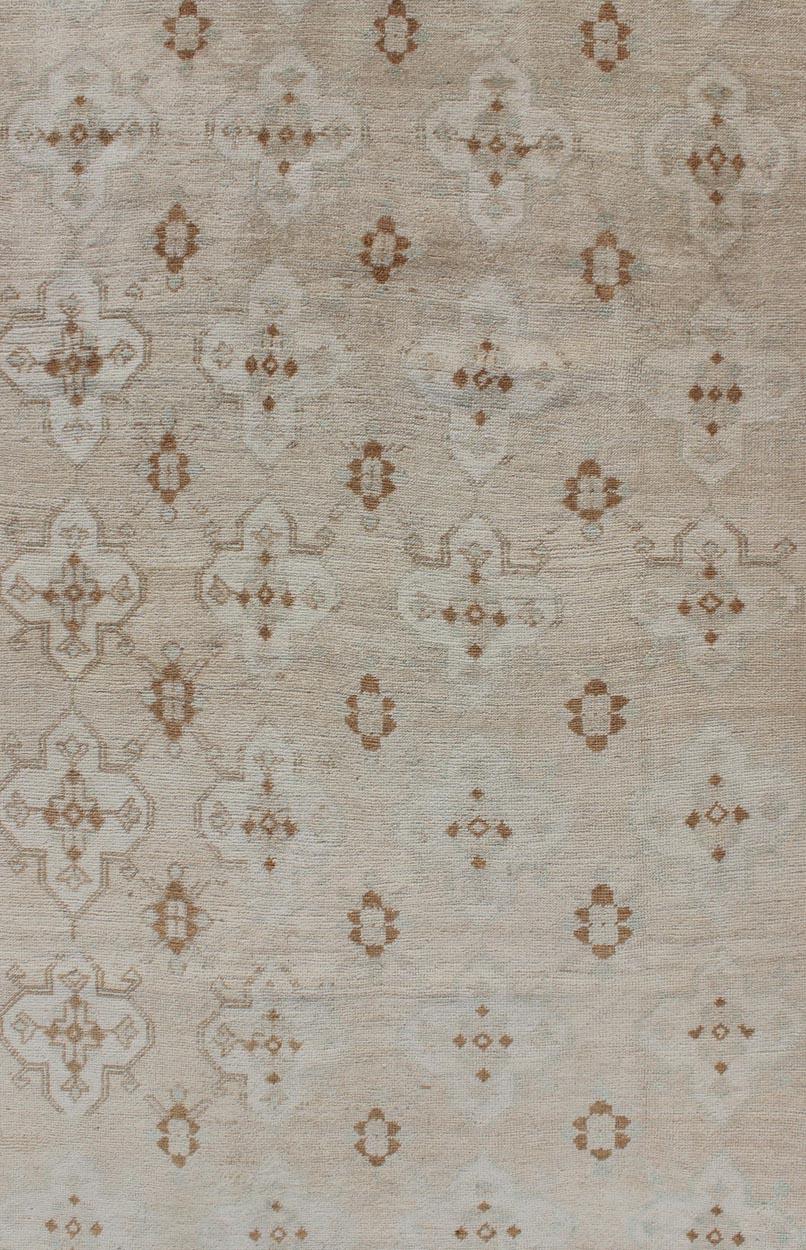 Muted Oushak with All-Over Tribal Design in Light Tones of Taupe and Browns For Sale 3