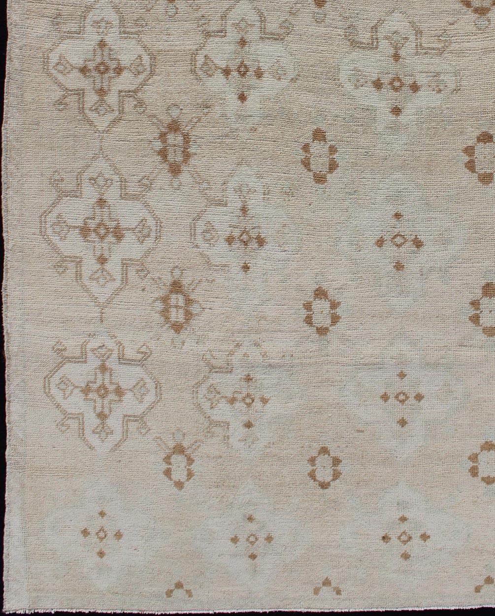 Muted Oushak with All-Over Tribal Design in Light Tones of Taupe and Browns For Sale 2