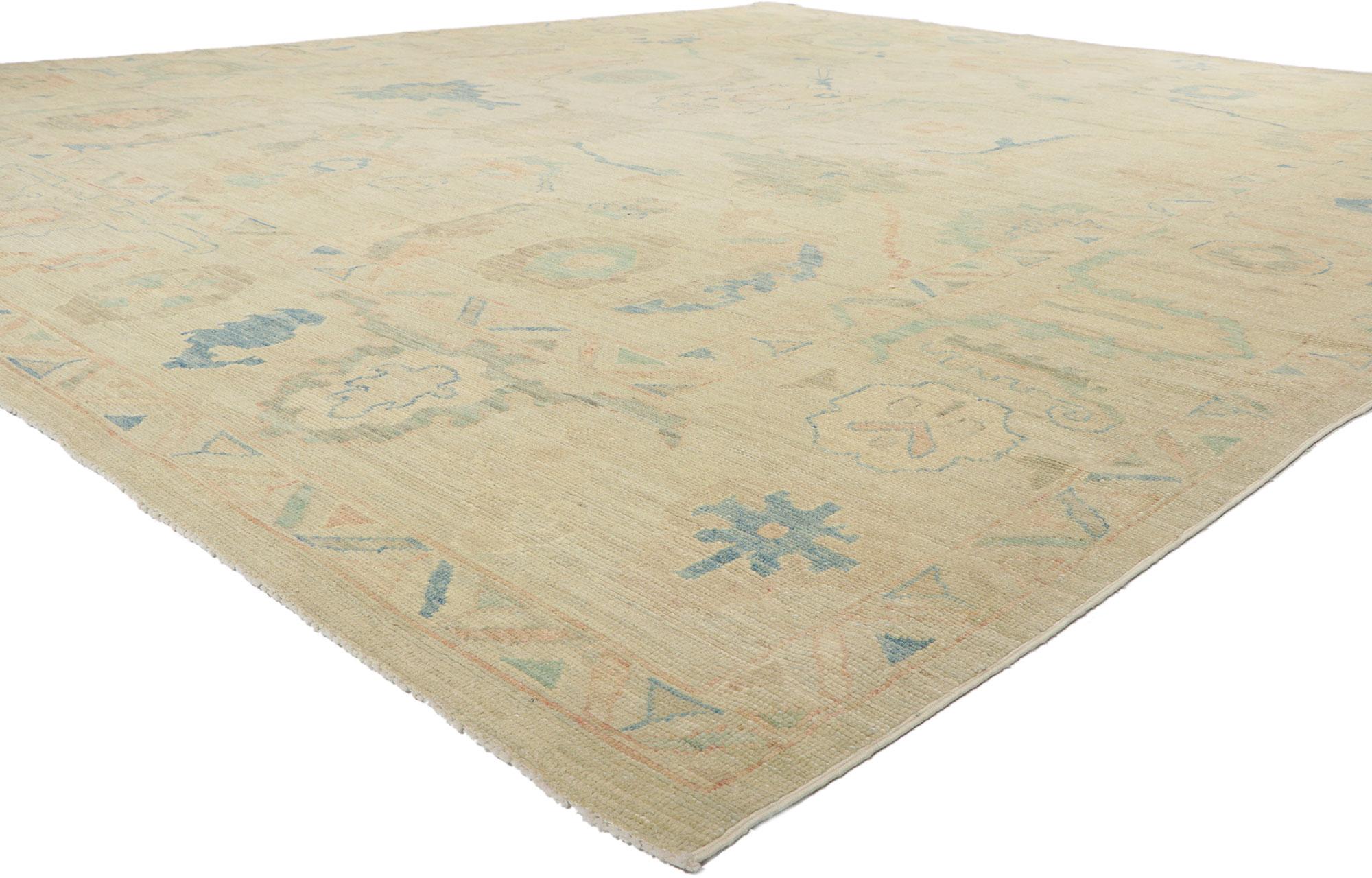 80934 Vintage-Inspired Modern Oushak Rug, 12'06 x 14'09.
Let yourself be whisked away on a journey of serenity, as you step onto this mesmerizing vintage-inspired modern Oushak rug. This magical carpet ride will transport you to a peaceful world of