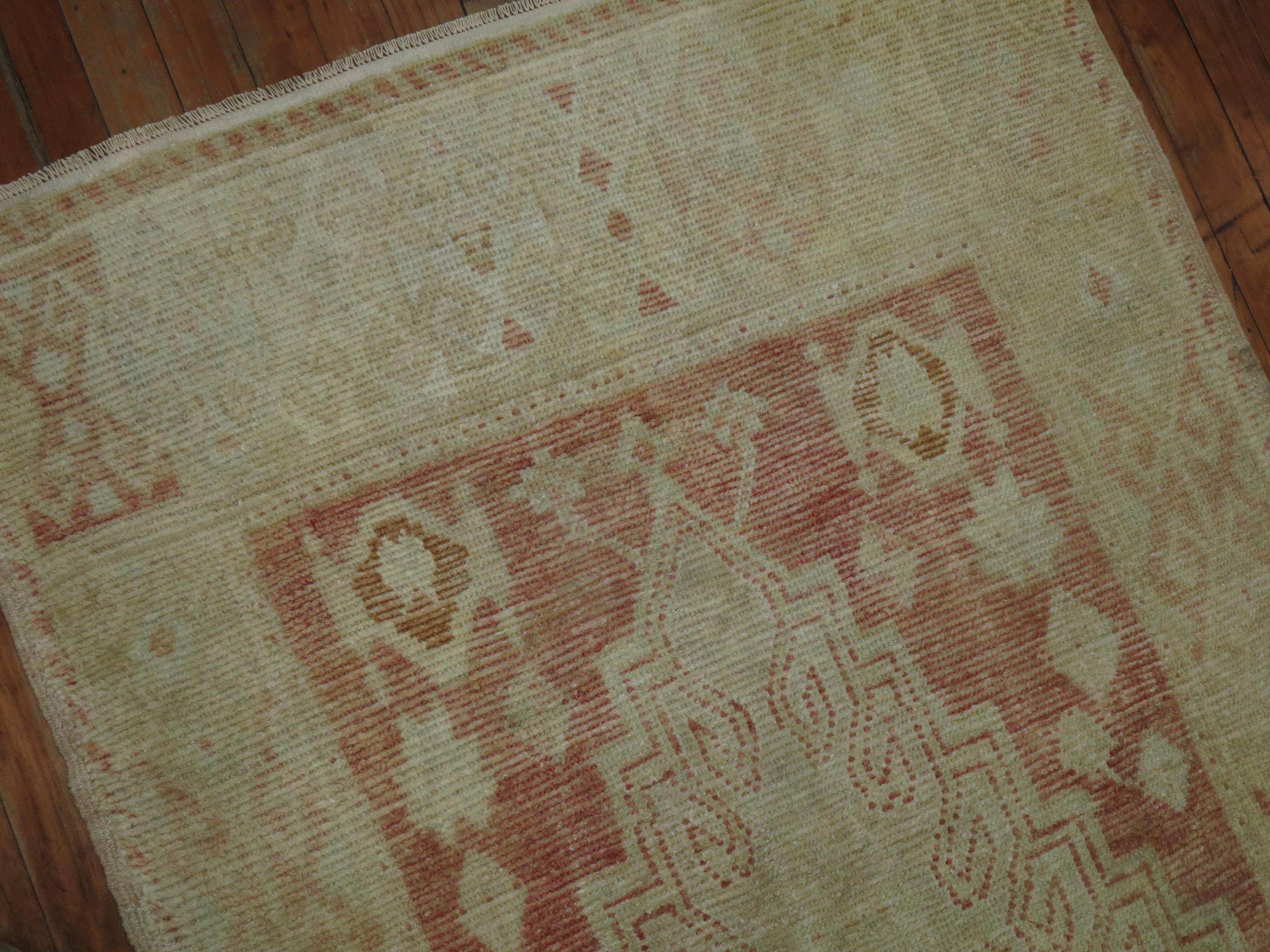 A mid-20th century Turkish Oushak runner. Subtle, soft, and pleasant to walk on. Measures: 3'3