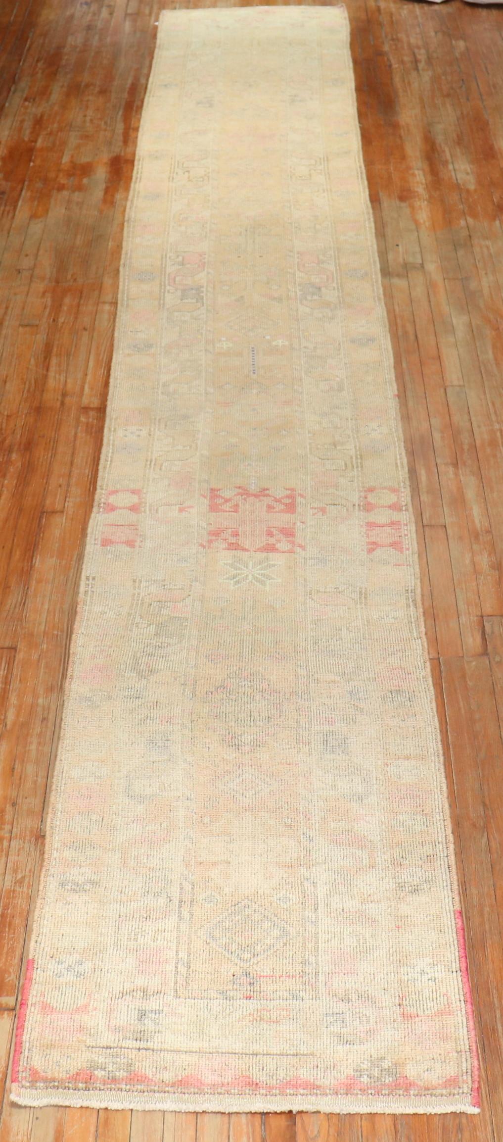 A rare long and narrow 20th century Turkish geometric mted runner.

Measures: 2'9