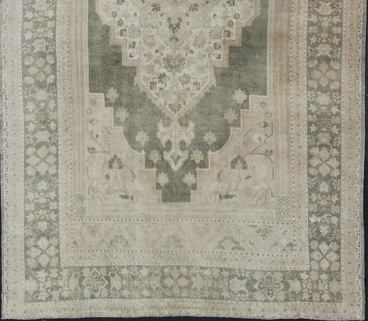 Hand-Knotted Muted Turkish Large Oushak with Medallion in Olive Green, Tan & Neutrals