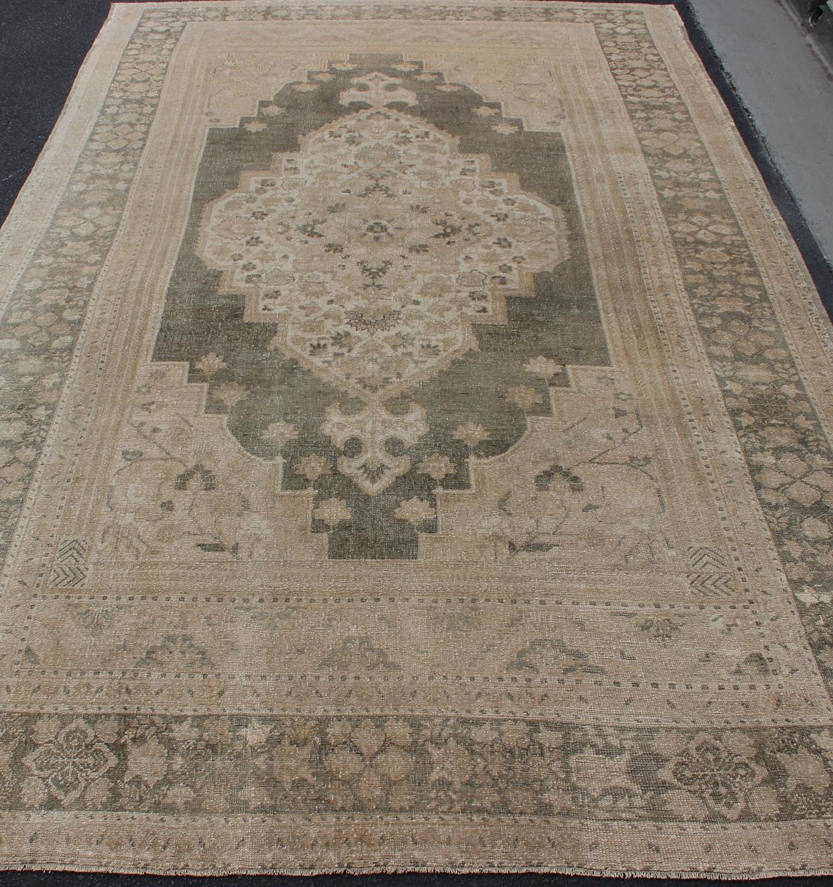 Wool Muted Turkish Large Oushak with Medallion in Olive Green, Tan & Neutrals