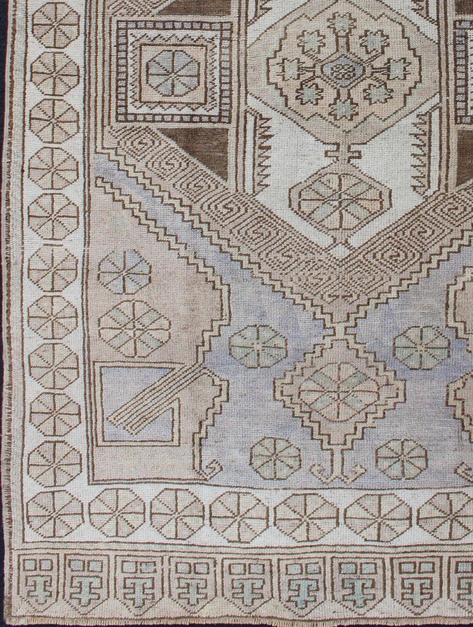 Hand-Knotted Muted Turkish Oushak with Geometric Medallion Design For Sale
