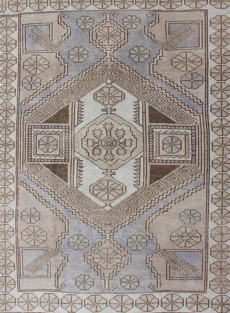 Muted Turkish Oushak with Geometric Medallion Design In Good Condition For Sale In Atlanta, GA