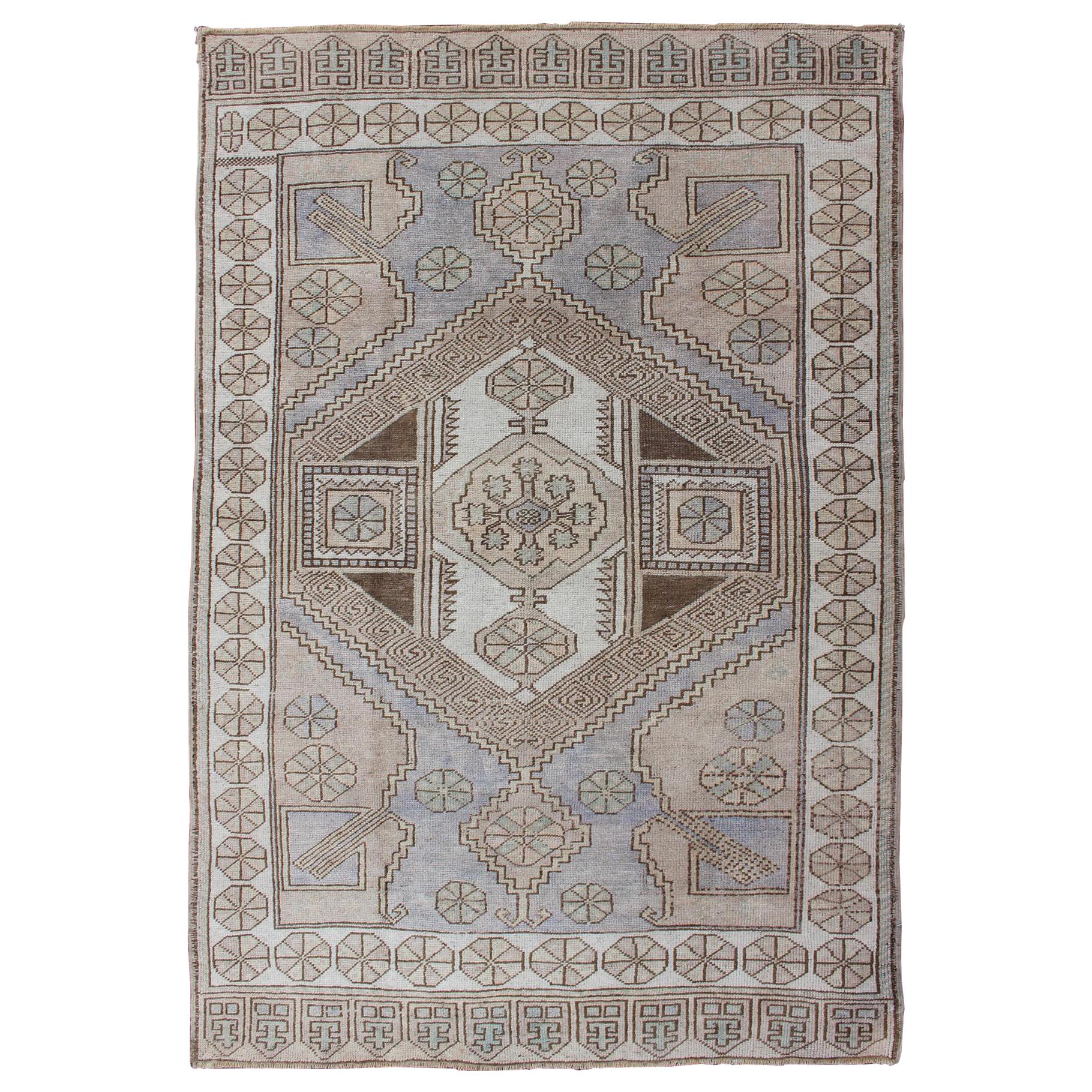 Muted Turkish Oushak with Geometric Medallion Design For Sale