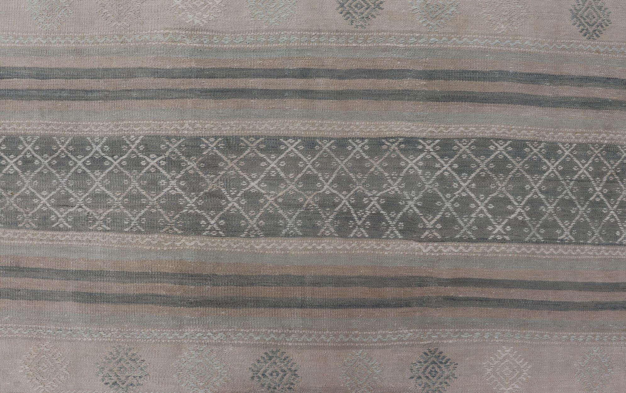Muted Vintage Turkish Kilim Rug with Horizontal Stripes & Tribal Motifs For Sale 2