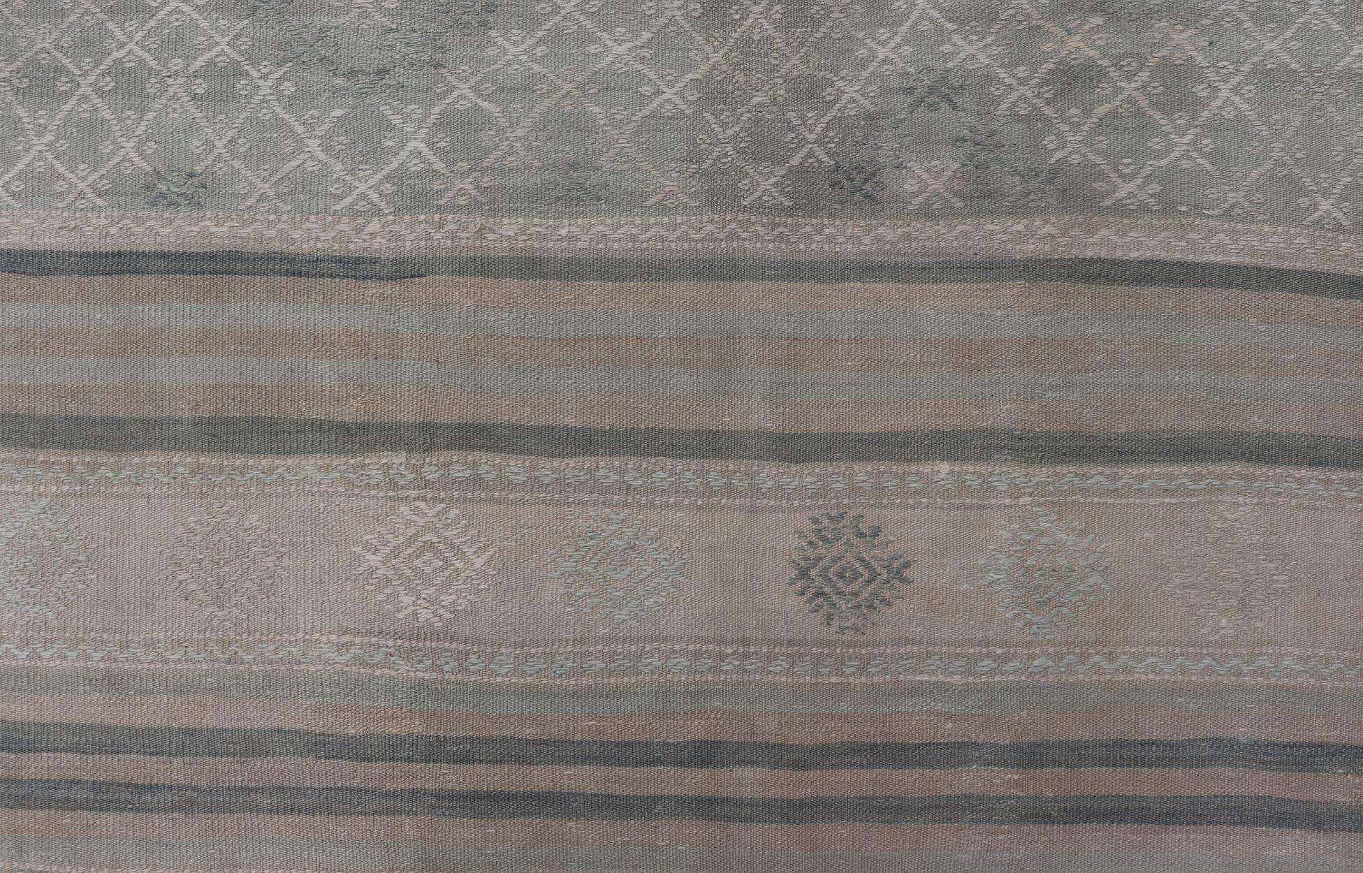 Muted Vintage Turkish Kilim Rug with Horizontal Stripes & Tribal Motifs For Sale 3