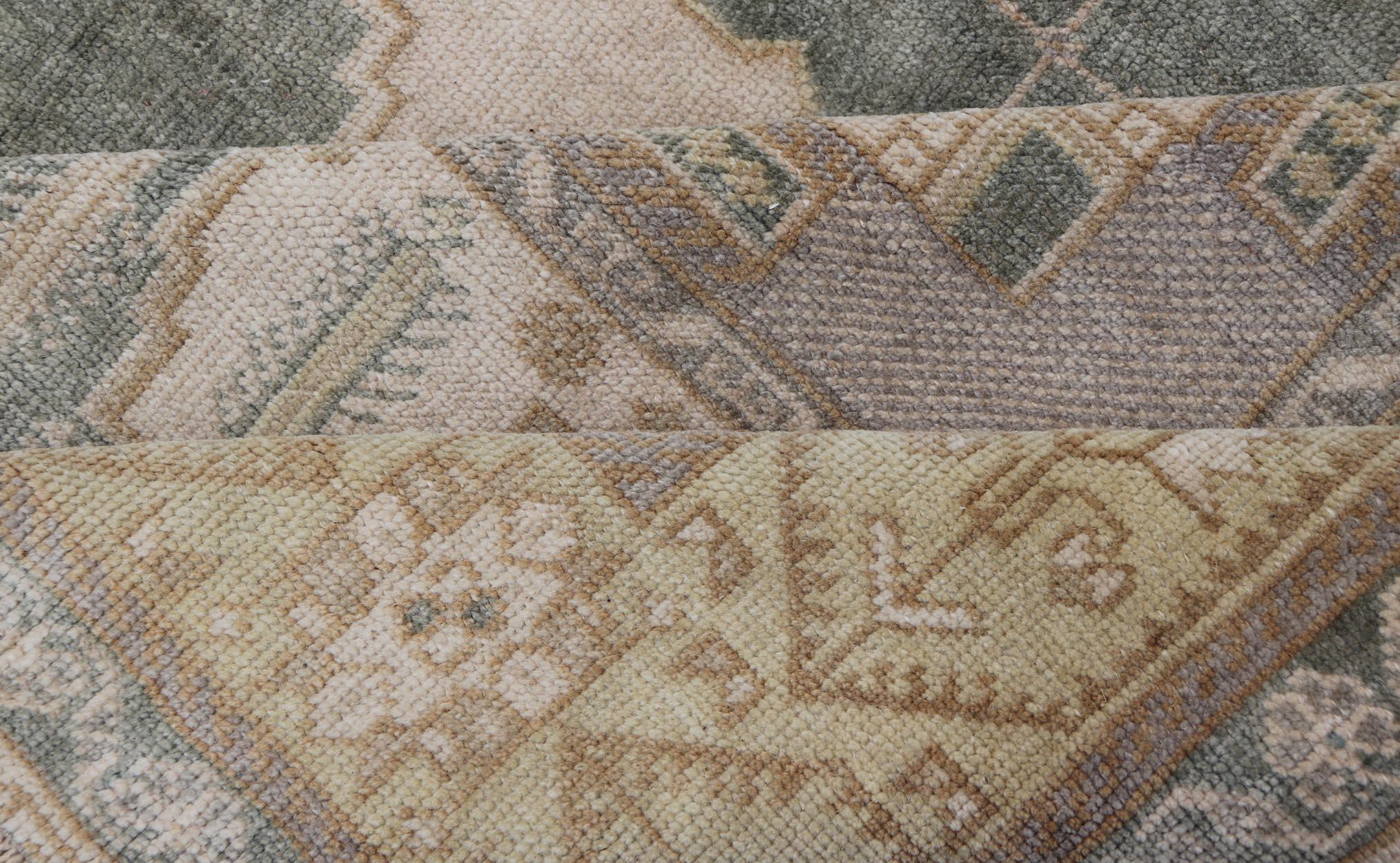 Muted Vintage Turkish Oushak in Wool with Sub-Geometric Medallion Design 2