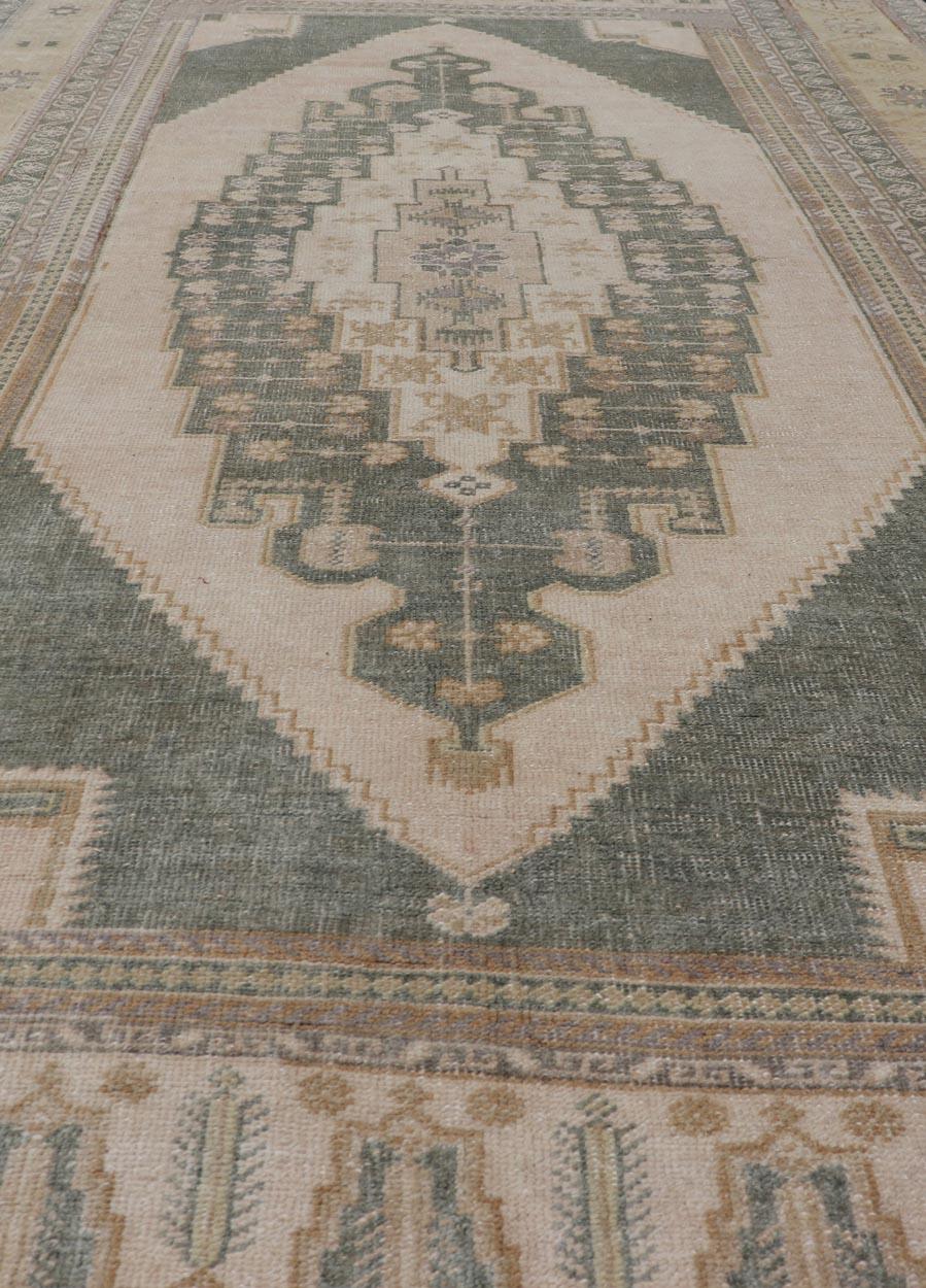 Muted Vintage Turkish Oushak in Wool with Sub-Geometric Medallion Design 3