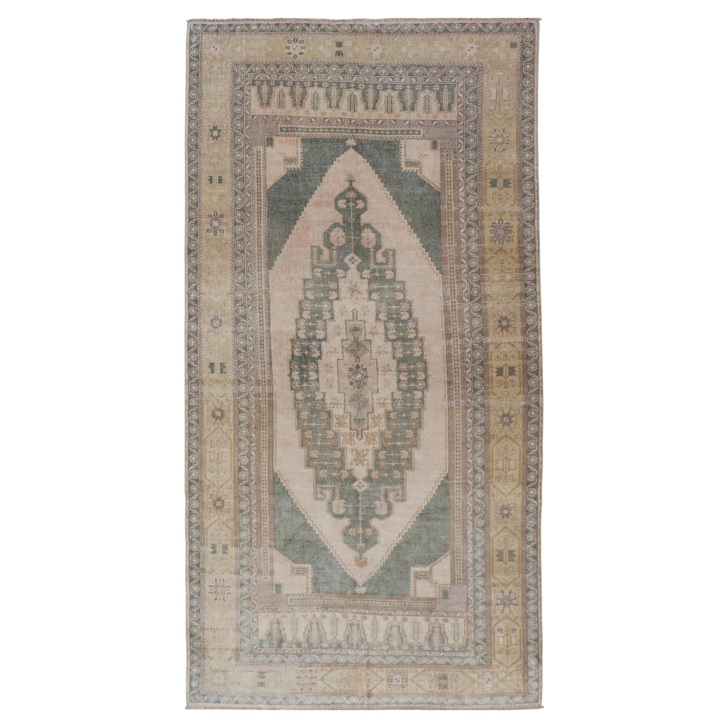 Muted Vintage Turkish Oushak in Wool with Sub-Geometric Medallion Design