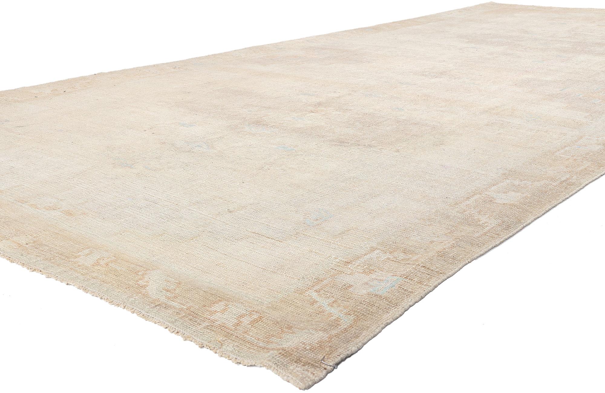 53712 Vintage Turkish Oushak Rug, 06'06 x 15'03. 
Reflecting elements of Shibui with incredible detail and texture, this hand knotted wool vintage Turkish Oushak rug is simple and subtle. The faded geometric silhouette and neutral colors woven into