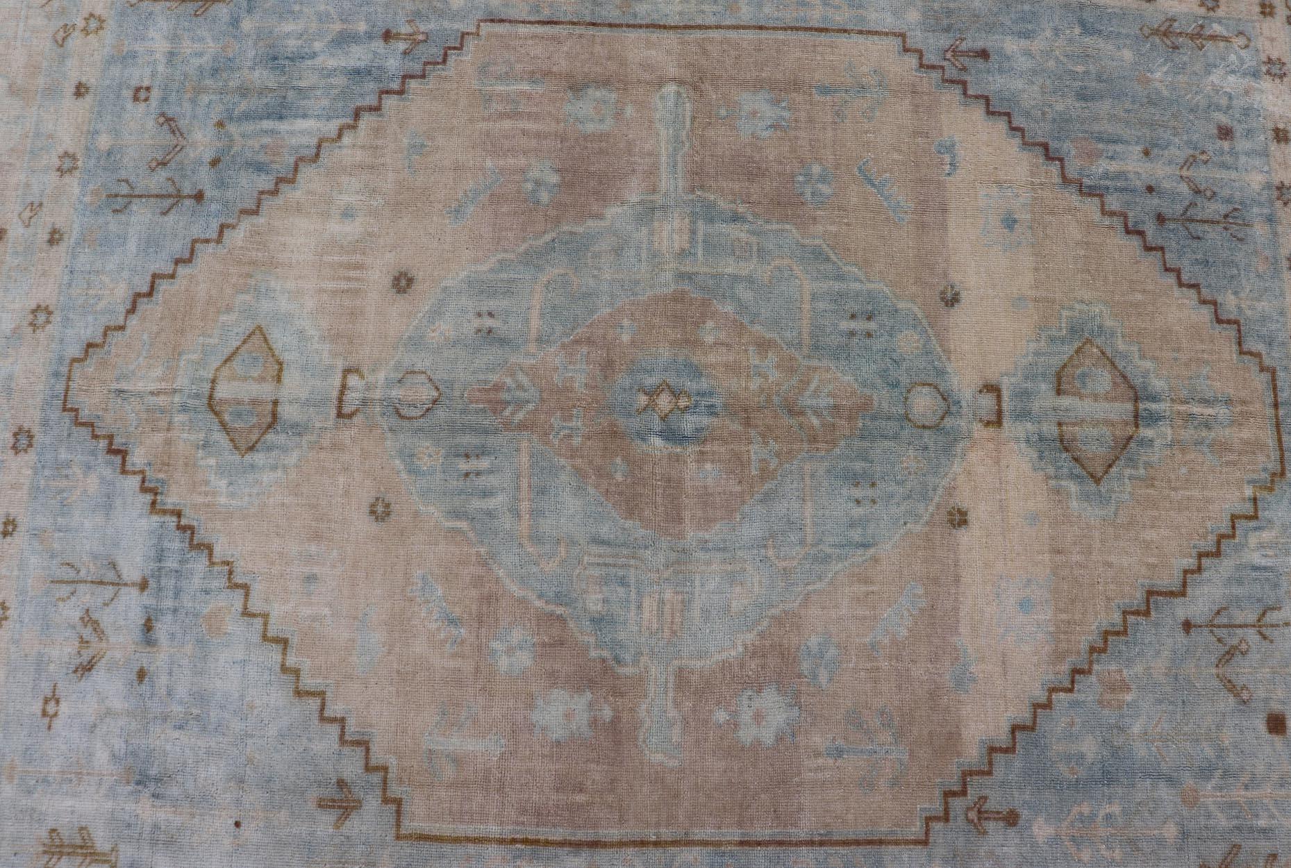 Hand-Knotted Muted Vintage Turkish Oushak Rug in Wool with Sub-Geometric Understated Design For Sale