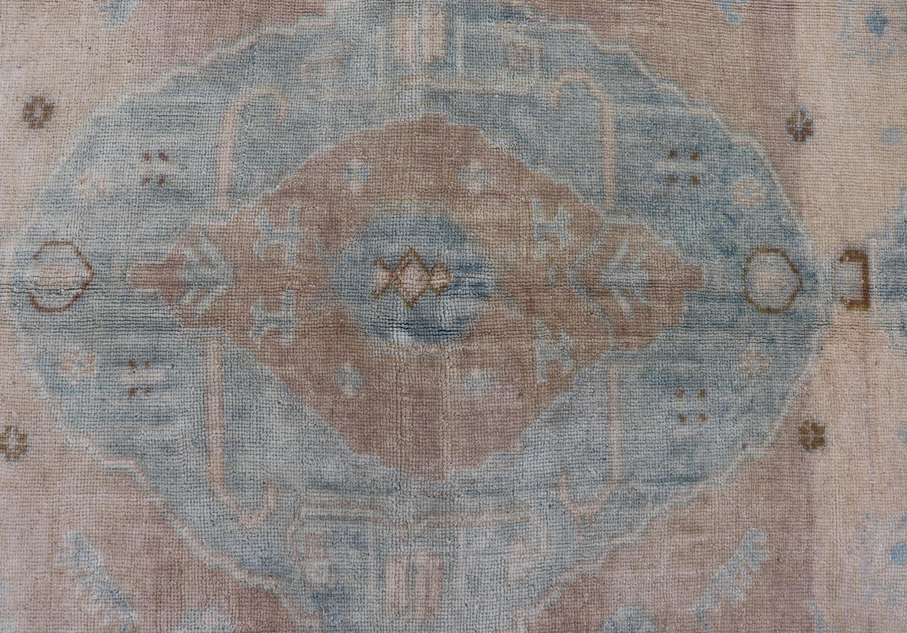 Muted Vintage Turkish Oushak Rug in Wool with Sub-Geometric Understated Design In Good Condition For Sale In Atlanta, GA