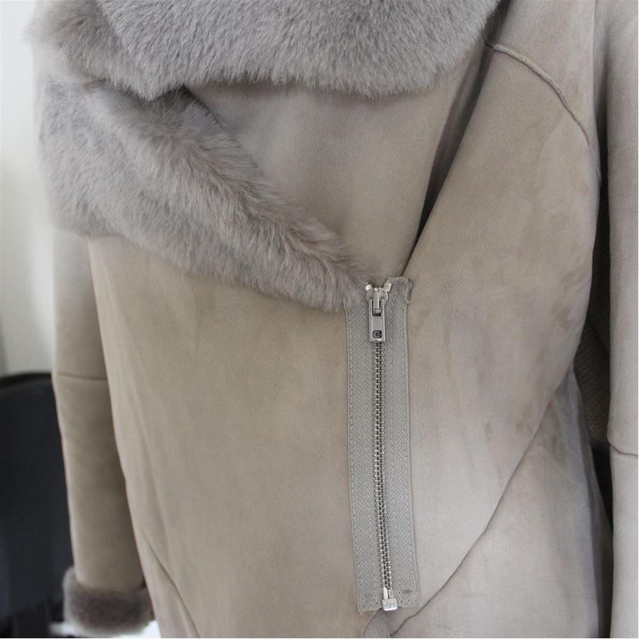 Real leather Ice color Wool on back Eco fur revers Two pockets Shoulder/hem cm 70 (27.55 inches) Original price euro 1088
