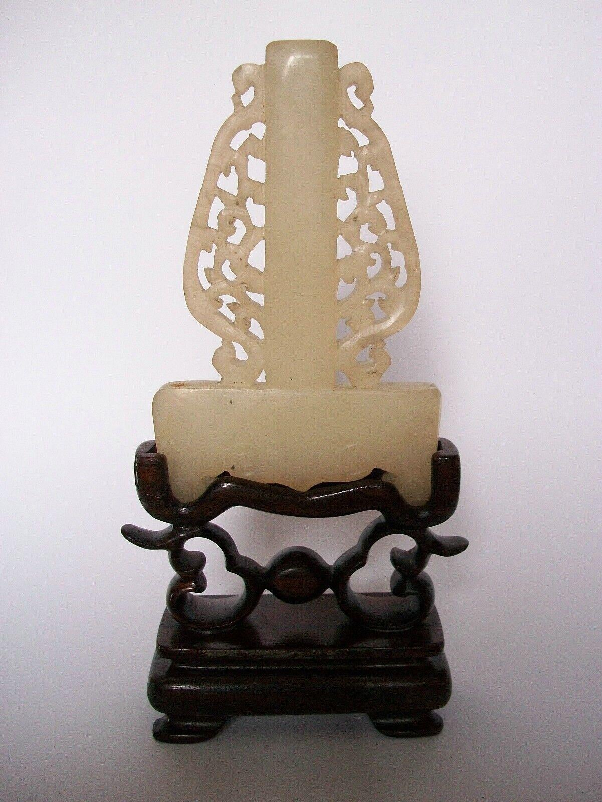 Chinese Mutton Fat Jade Carving on Hardwood Stand, Unsigned, China, 20th Century For Sale