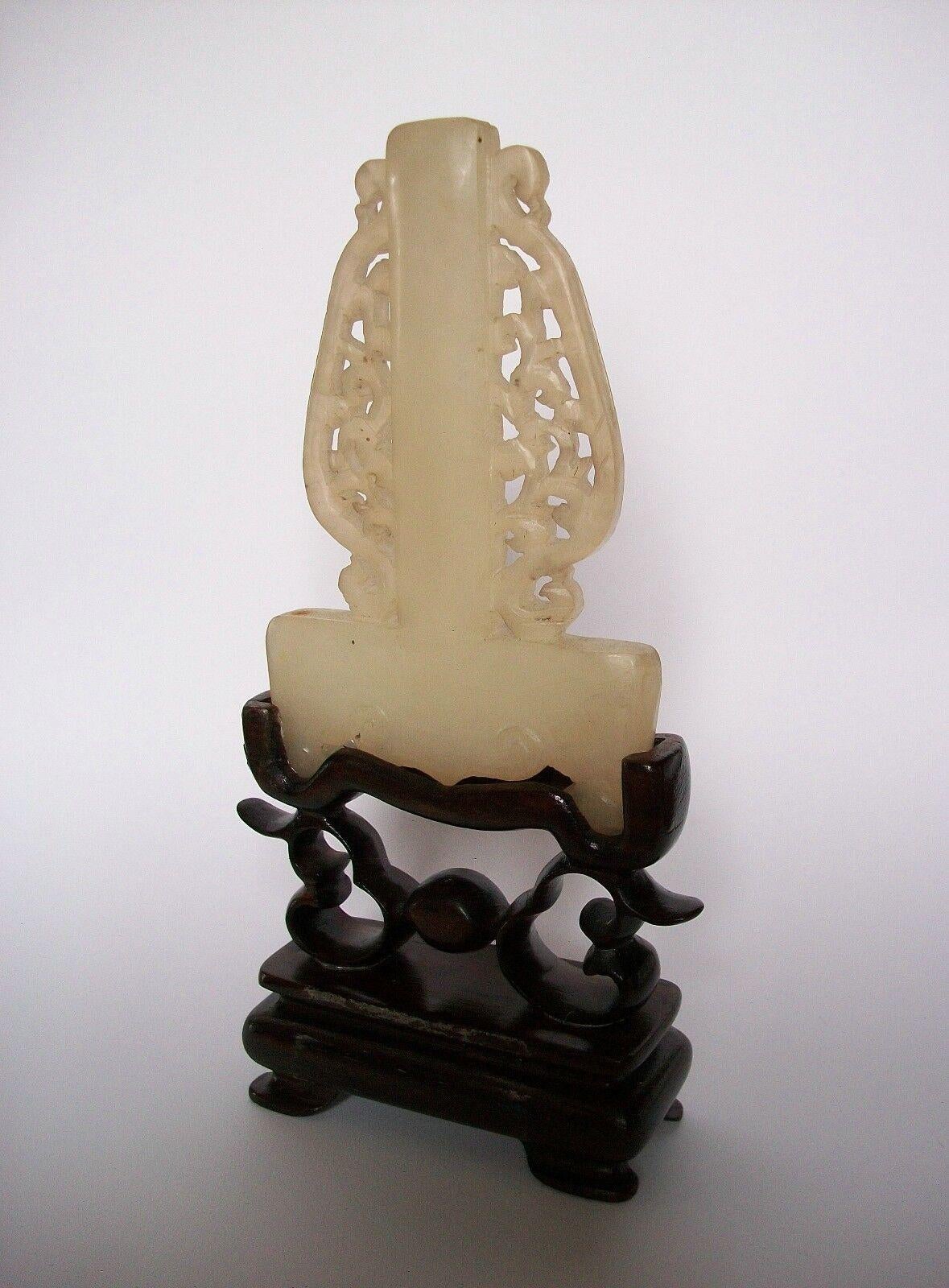 Hand-Carved Mutton Fat Jade Carving on Hardwood Stand, Unsigned, China, 20th Century For Sale