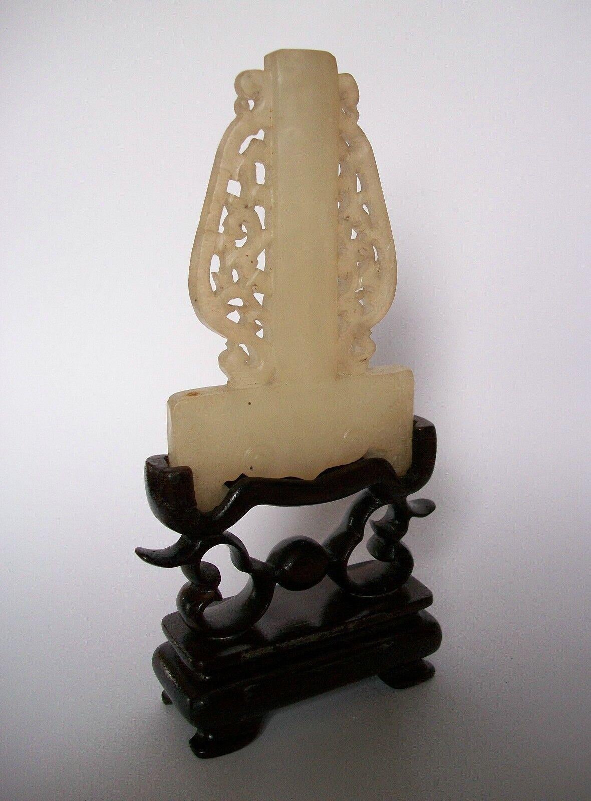 Mutton Fat Jade Carving on Hardwood Stand, Unsigned, China, 20th Century In Good Condition For Sale In Chatham, ON