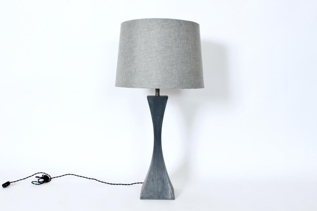 Modern Mutual Sunset Lamp Company Gray enameled cast aluminum table lamp, in the manner of Stewart Ross James. Featuring a flowing splayed form in Gray enameled cast aluminum. Lampshade shown for display only and not for sale (10H x 13D top x 15D