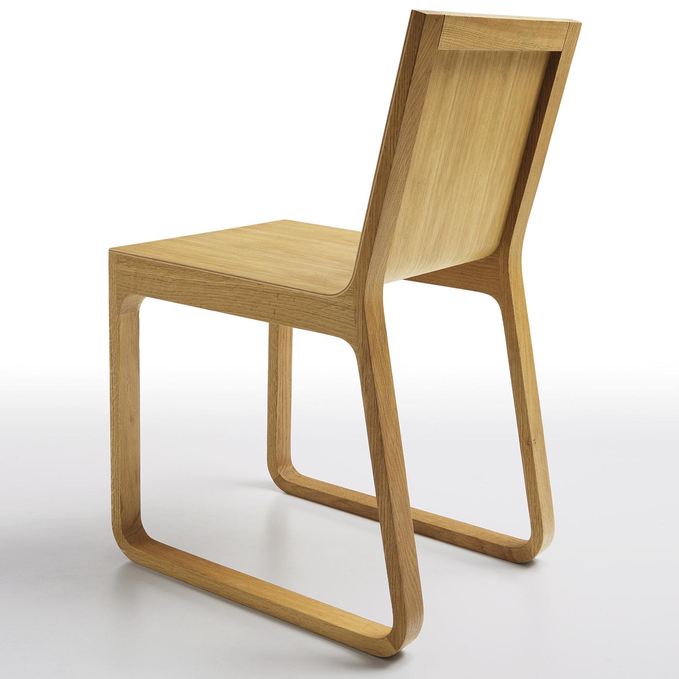 Designed by Finnish designer Harri Koskinen, who won the prestigious Compass d'ora award in 2004 with this piece, the Muu chair is a stunning example of the subtle elegance of Scandinavian style. The open structure of this exquisite piece of
