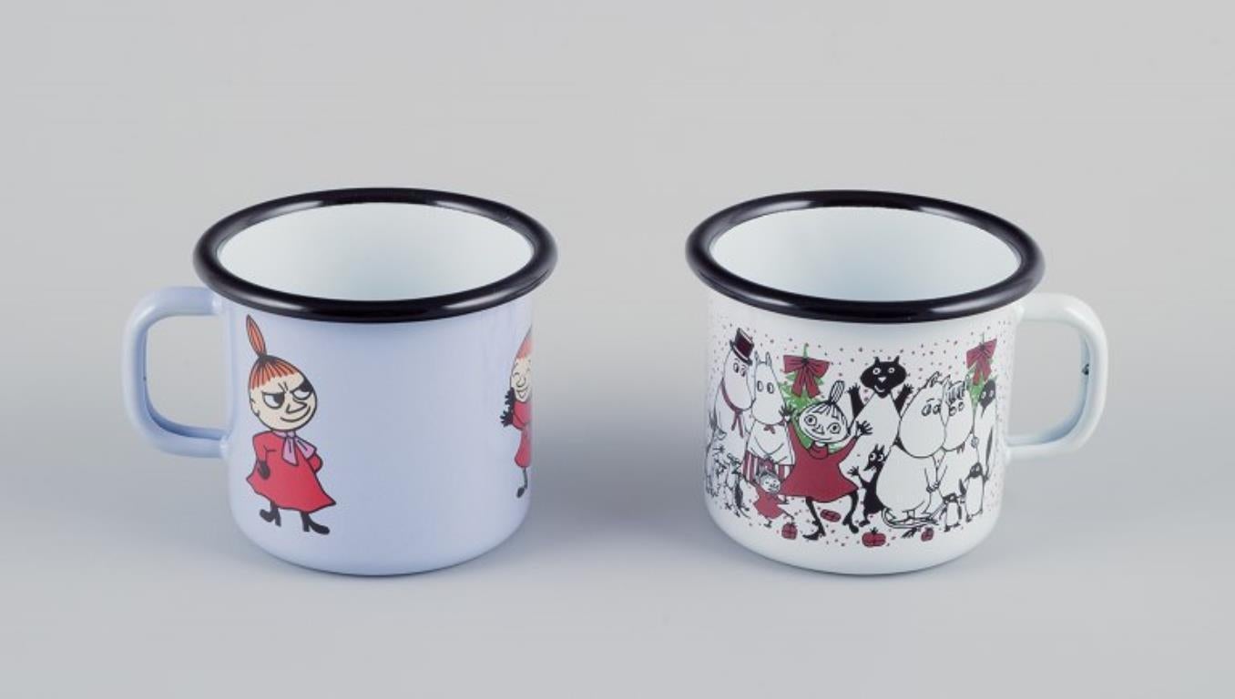 Finnish Muurla, Finland. Four enamel mugs with motifs from the Moomin stories For Sale