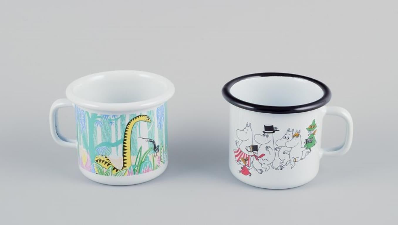 Enameled Muurla, Finland. Four enamel mugs with motifs from the Moomin stories For Sale