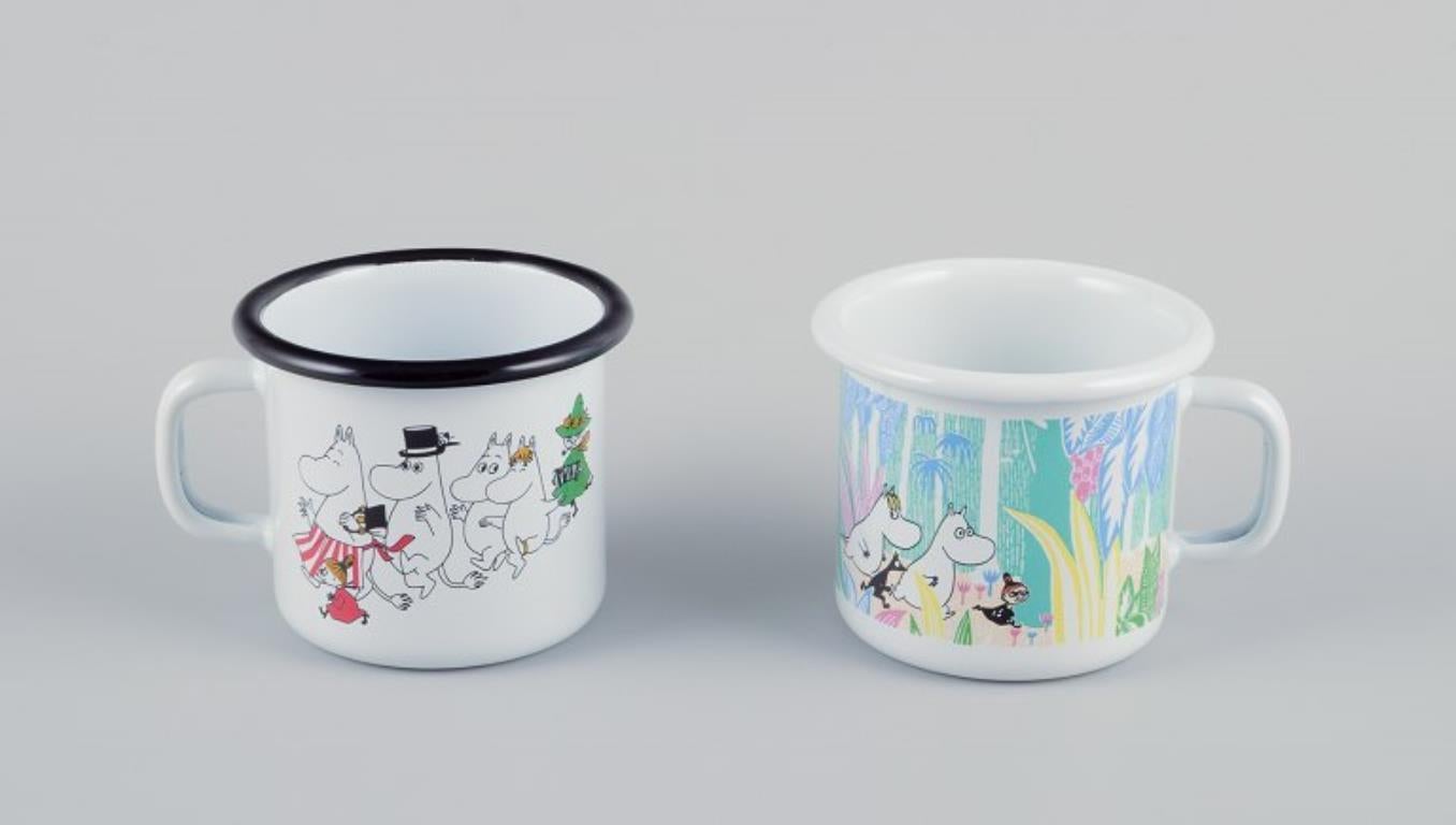 Muurla, Finland. Four enamel mugs with motifs from the Moomin stories In Excellent Condition For Sale In Copenhagen, DK