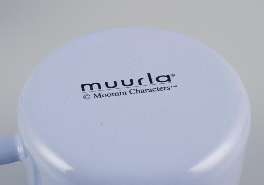 Muurla, Finland. Four enamel mugs with motifs from the Moomin stories For Sale 1