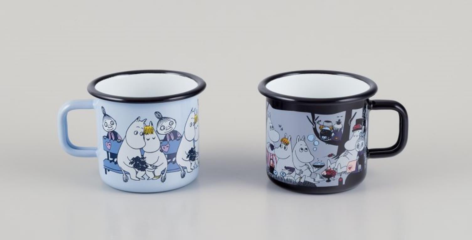 Muurla, Finland. 
Four enamel mugs with different motifs from the Moomintroll stories.
2000s.
Marked.
Perfect condition.
Dimensions: D 8.5 cm without handle x H 7.0 cm.