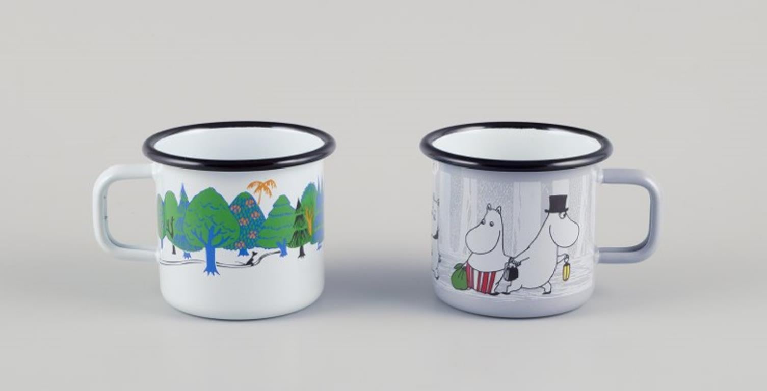 Muurla, Finland. Four enamel mugs with motifs from the Moomins stories, 21st C In Excellent Condition For Sale In Copenhagen, DK