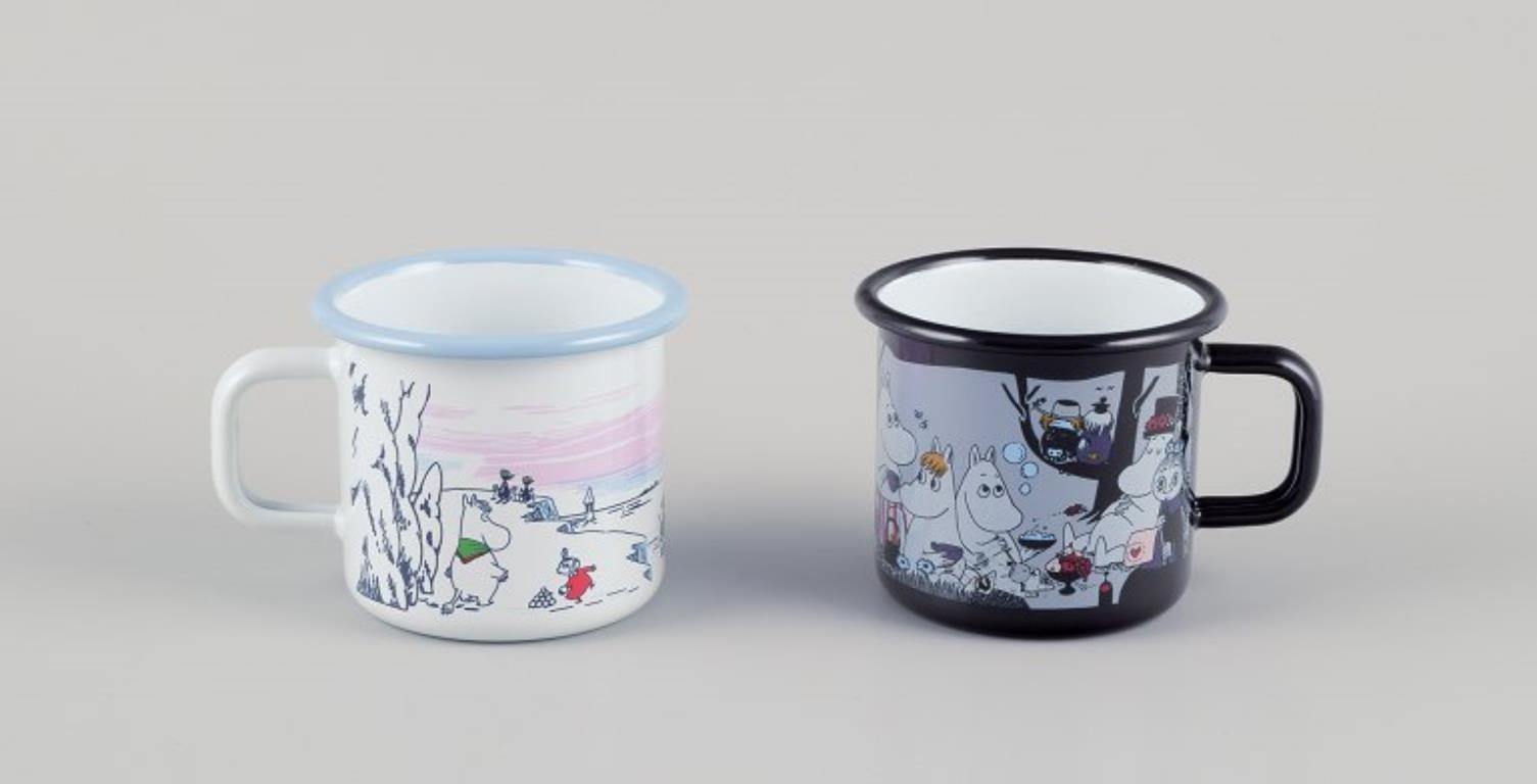 Muurla, Finland. 
Four enamel mugs with different motifs from the Moomintroll stories.
2000s.
Marked.
Perfect condition.
Dimensions: D 8.5 cm without handle x H 7.0 cm.
