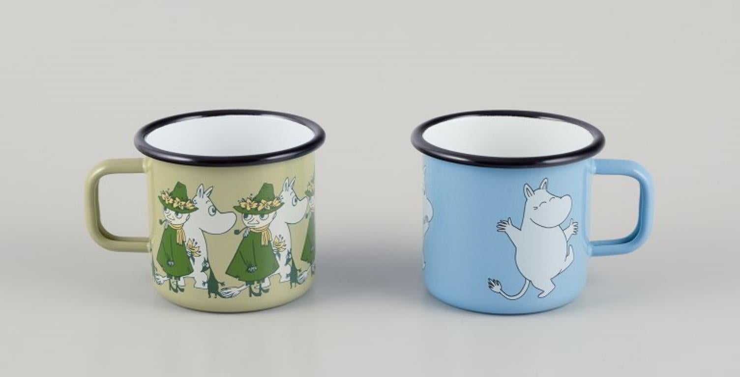 Finnish Muurla, Finland. Four enamel mugs with motifs from the Moomintroll stories For Sale