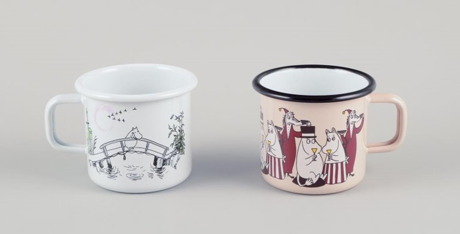 Enameled Muurla, Finland. Four enamel mugs with motifs from the Moomintroll stories For Sale