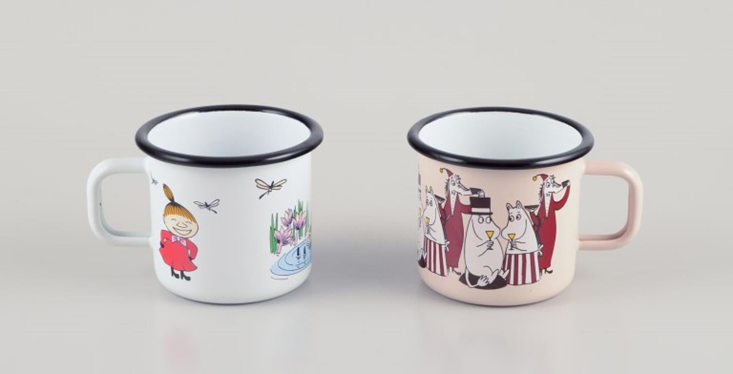 Enameled Muurla, Finland. Four enamel mugs with motifs from the Moomintroll stories For Sale