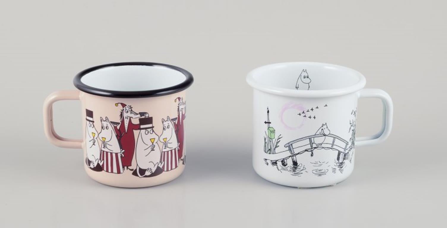 Muurla, Finland. Four enamel mugs with motifs from the Moomintroll stories In Excellent Condition For Sale In Copenhagen, DK