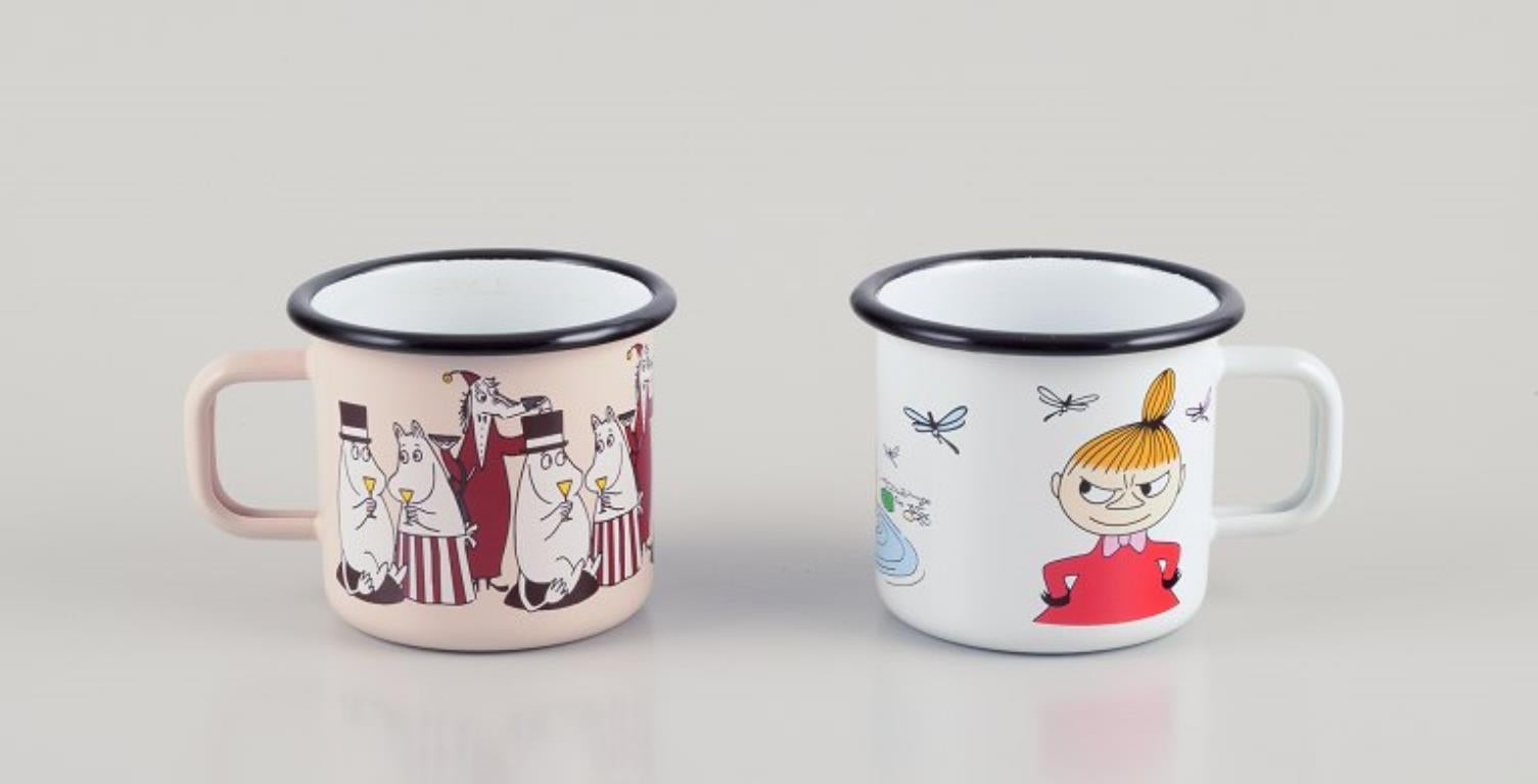 Muurla, Finland. Four enamel mugs with motifs from the Moomintroll stories In Excellent Condition For Sale In Copenhagen, DK