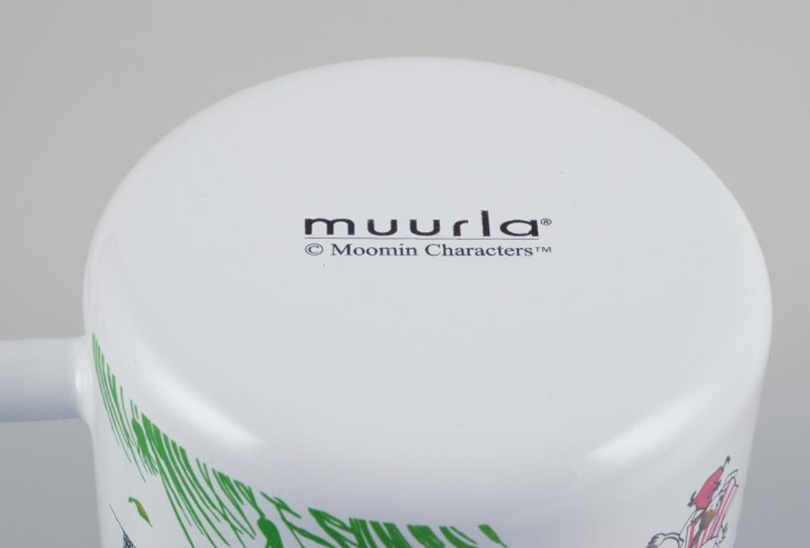 Contemporary Muurla, Finland. Four enamel mugs with motifs from the Moomintroll stories For Sale