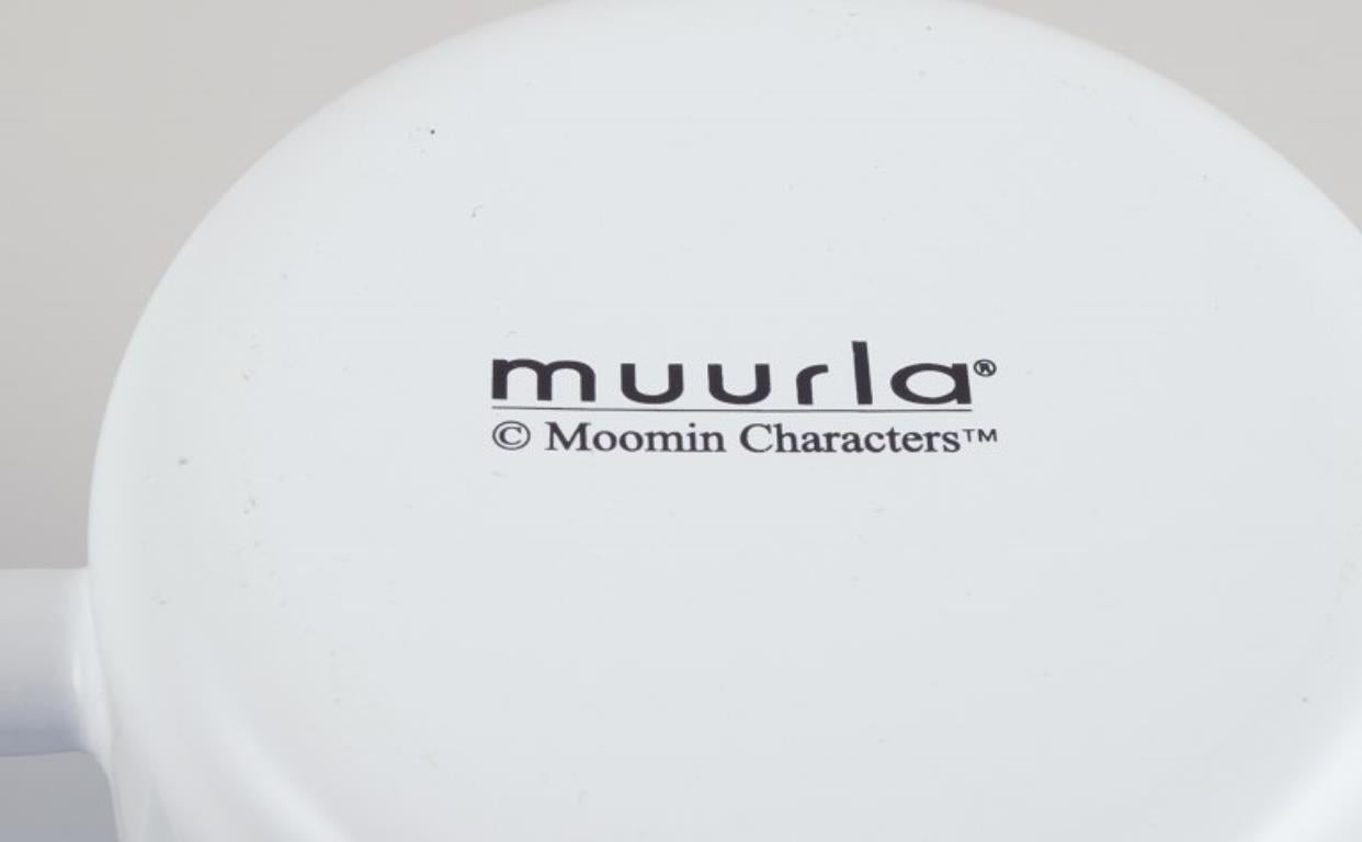 Contemporary Muurla, Finland. Four enamel mugs with motifs from the Moomintroll stories For Sale